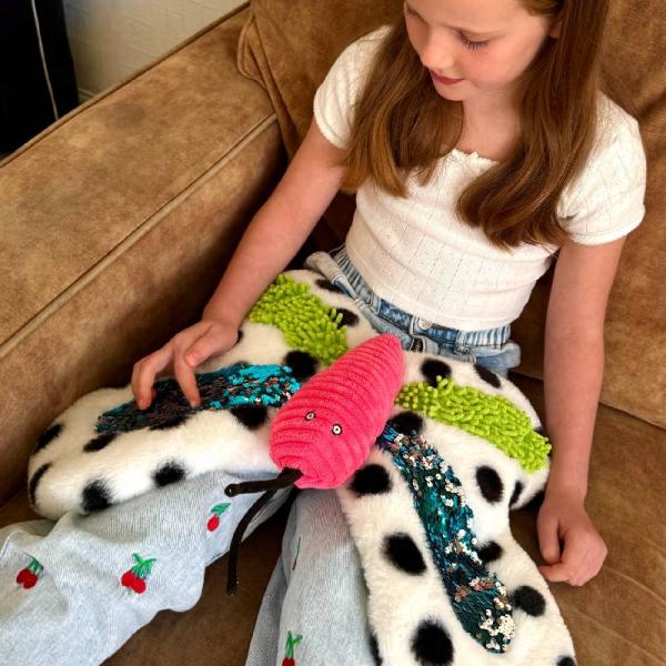 Verzwaard tactiele vlinder met glitters